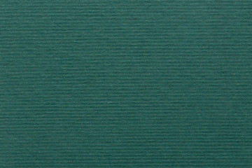 Dark green paper background, colorful  texture.