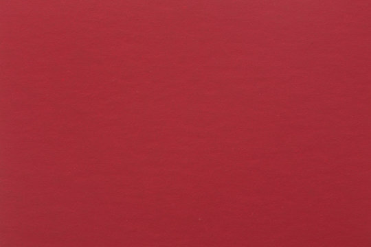 Red handmade paper background.
