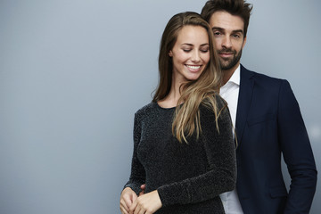 Sharp dressed couple in studio