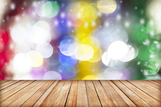 image of wood table and blurred bokeh background with colorful l