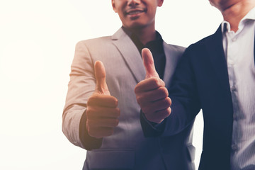 isolate background; businessman partnership meeting concept. two man showing thumbs up. Successful thumbs up after good deal. 