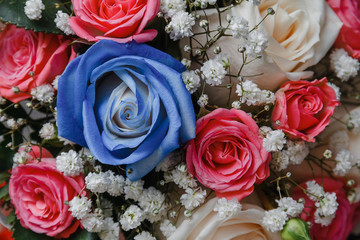 Bridal bouquet with blue roses in composition