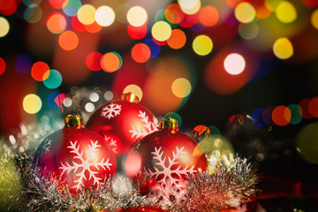 Fototapeta na wymiar Christmas balls on a blur background