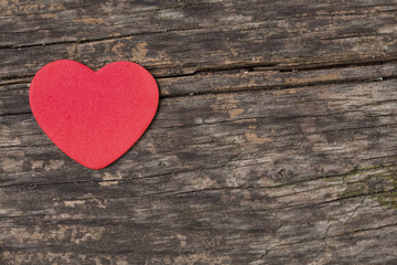 Read heart on wooden background.Valentines Day background with hearts.