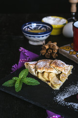 apple pie with fresh fruits on wooden table