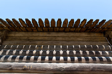 The play of light and shadow under the roof of the old church in