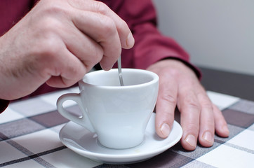 tea cup in man's hands
