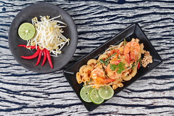 Thai fried macaroni with shrimp , call Pad Thai Macaroni in Thai,served with side dish © smilekorn