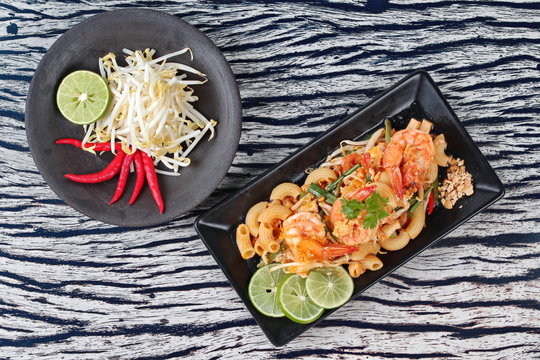 Thai fried macaroni with shrimp , call Pad Thai Macaroni in Thai,served with side dish