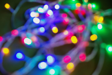 Blur bokeh from Christmas lights with wooden background