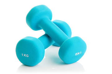 Two dumbbells on a white background