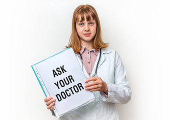 Doctor showing clipboard with written text: Ask Your Doctor