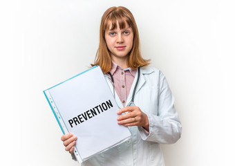 Female doctor showing clipboard with written text: Prevention