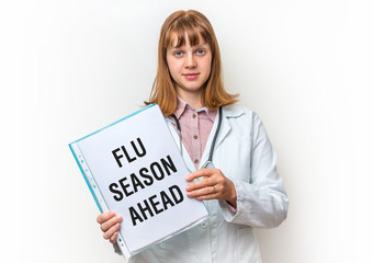 Doctor showing clipboard with written text: Flu Season Ahead