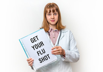 Doctor showing clipboard with text: Get Your Flu Shot