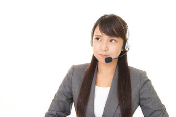 不満そうな表情のオペレーター