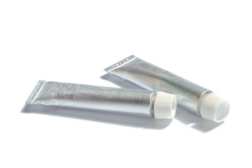 paint in tubes isolated on white