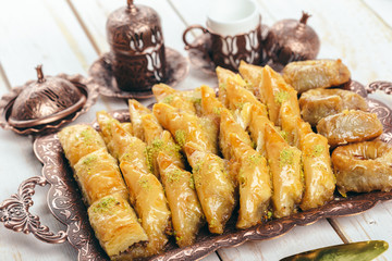  traditional eastern desserts on wooden background