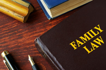 Book with title family law on a table.