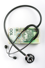 stethoscope and polish money (100 zloty)