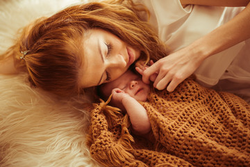 Pretty mother with a newborn