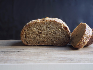 Rustic bread on wood background