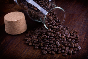 glass bottle full of coffee beans
