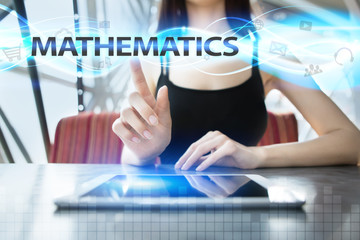Woman is using tablet pc, pressing on virtual screen and selecting mathematics