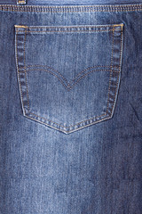 Close-up of a blue jeans back pocket