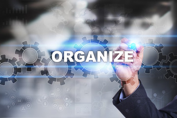 Businessman is drawing on virtual screen. organize concept.