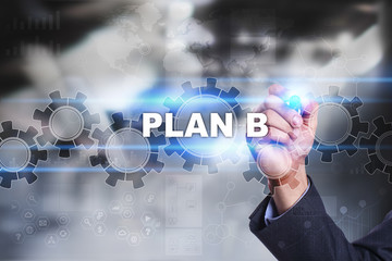Businessman is drawing on virtual screen. plan b concept.