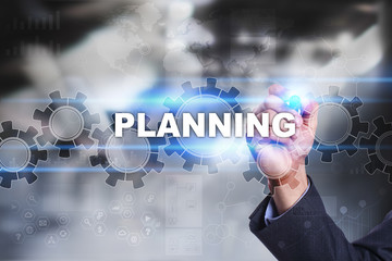 Businessman is drawing on virtual screen. planning concept.