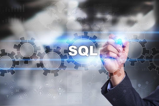 Businessman is drawing on virtual screen. sql concept.