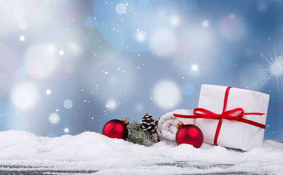 Christmas background, Holiday decoration, balls on snow and wooden table