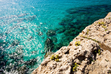 Stone cliff in a beautiful blue sea Cyprus
