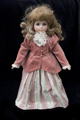 Close Up and Isolated Vintage Antique Old Doll