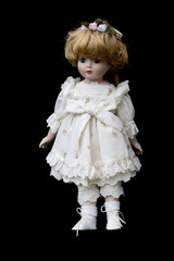 Close Up and Isolated Vintage Antique Old Doll