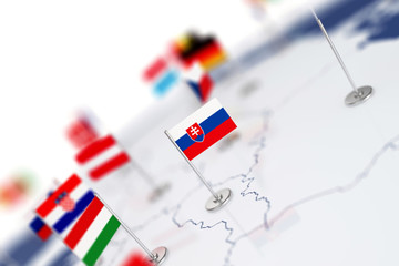 Slovakia flag in the focus. Europe map with countries flags