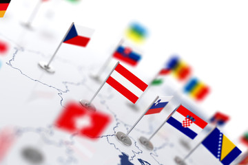 Austria flag in the focus. Europe map with countries flags