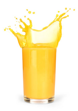 glass of splashing orange juice isolated on white