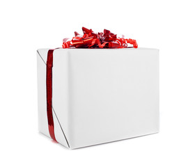 Gift box with red ribbon for Christmas.