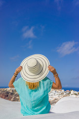 Fototapeta na wymiar Young woman on holidays, Santorini