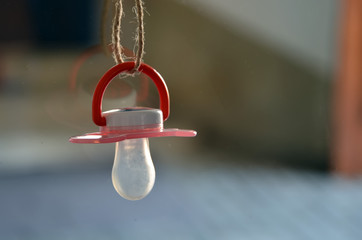 old child rubber dummy detail macro photography