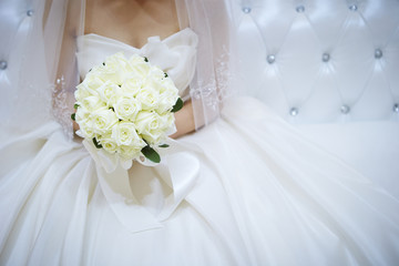 Bride holding wedding bouquet