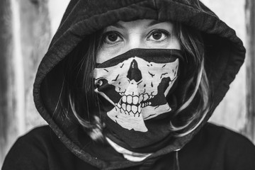 Creepy woman in black hood 