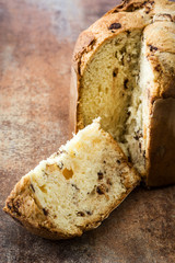 Christmas cake panettone on rustic background

