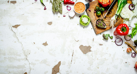 Fototapeta na wymiar Organic food. Cutting Board with vegetables and herbs.