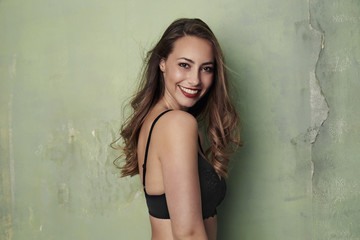 Naklejka premium Stunning underwear model smiling at camera