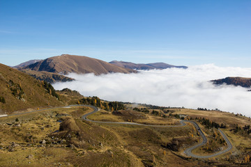View From Klomnock 2.331m To Nockalm Road In Carinthia Austria In Autumn