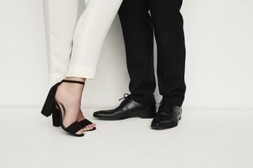Couple in footwear fashion, low section